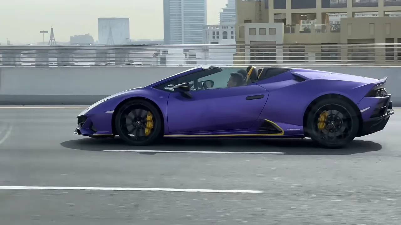 Driving on wide UAE freeway at dusk
