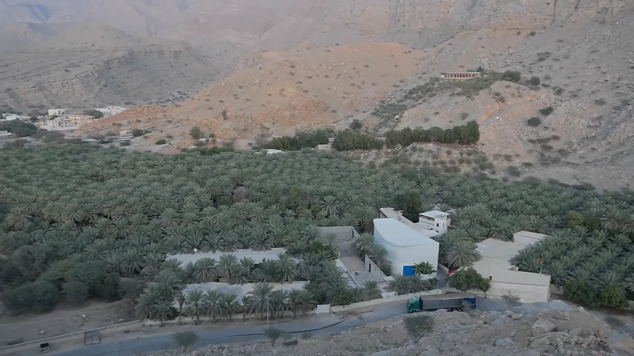 Jebel Jais mountain road and cars at the rally
