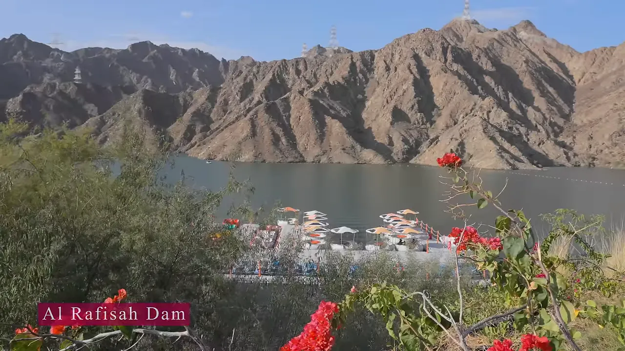 Khorfakkan beachfront promenade against the Hajar Mountains